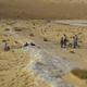 The excavations at the Al Wusta site, Saudi Arabia. The ancient lake bed (shown in white) is surrounded by sand dunes of the Nefud Desert.